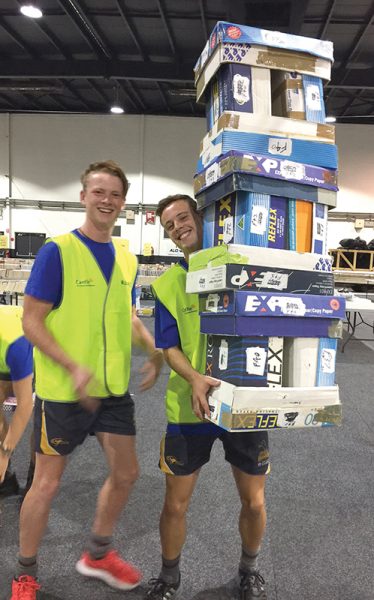 Helping stack and move books for the annual Lifeline Bookfair